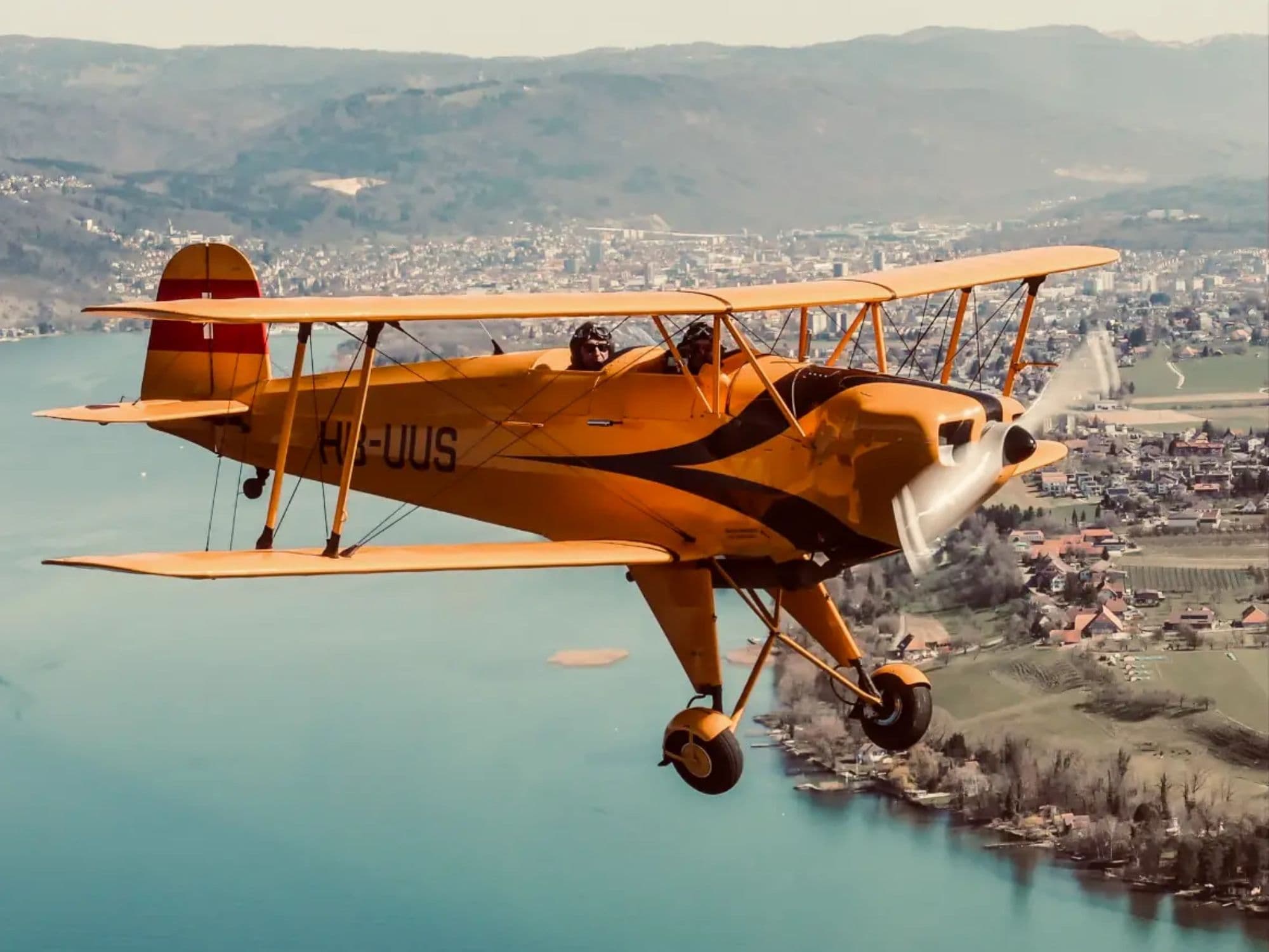 Flight in an open vintage biplane over the Zurich Oberland