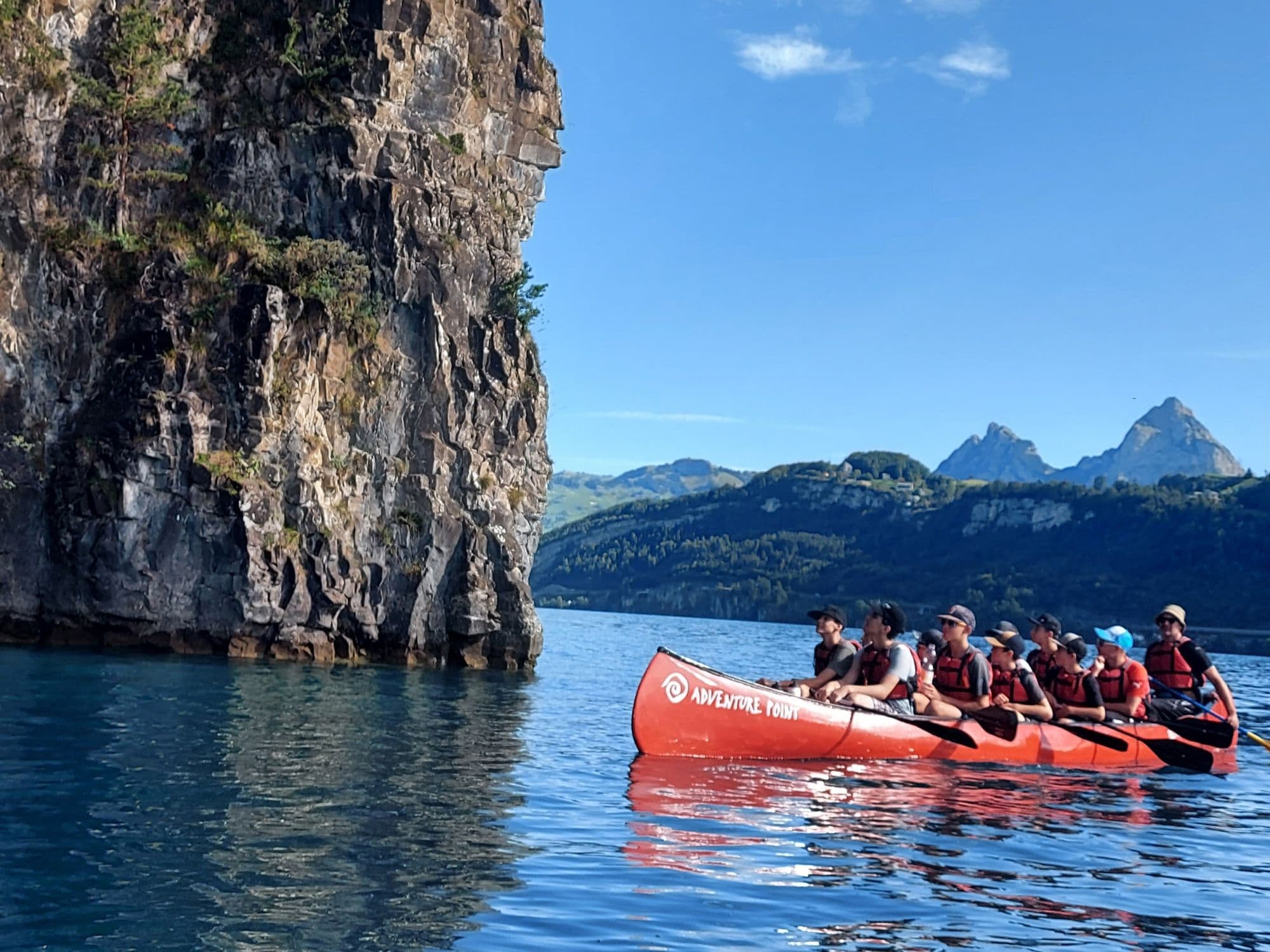 Team event with the big canoe on Lake Lucerne