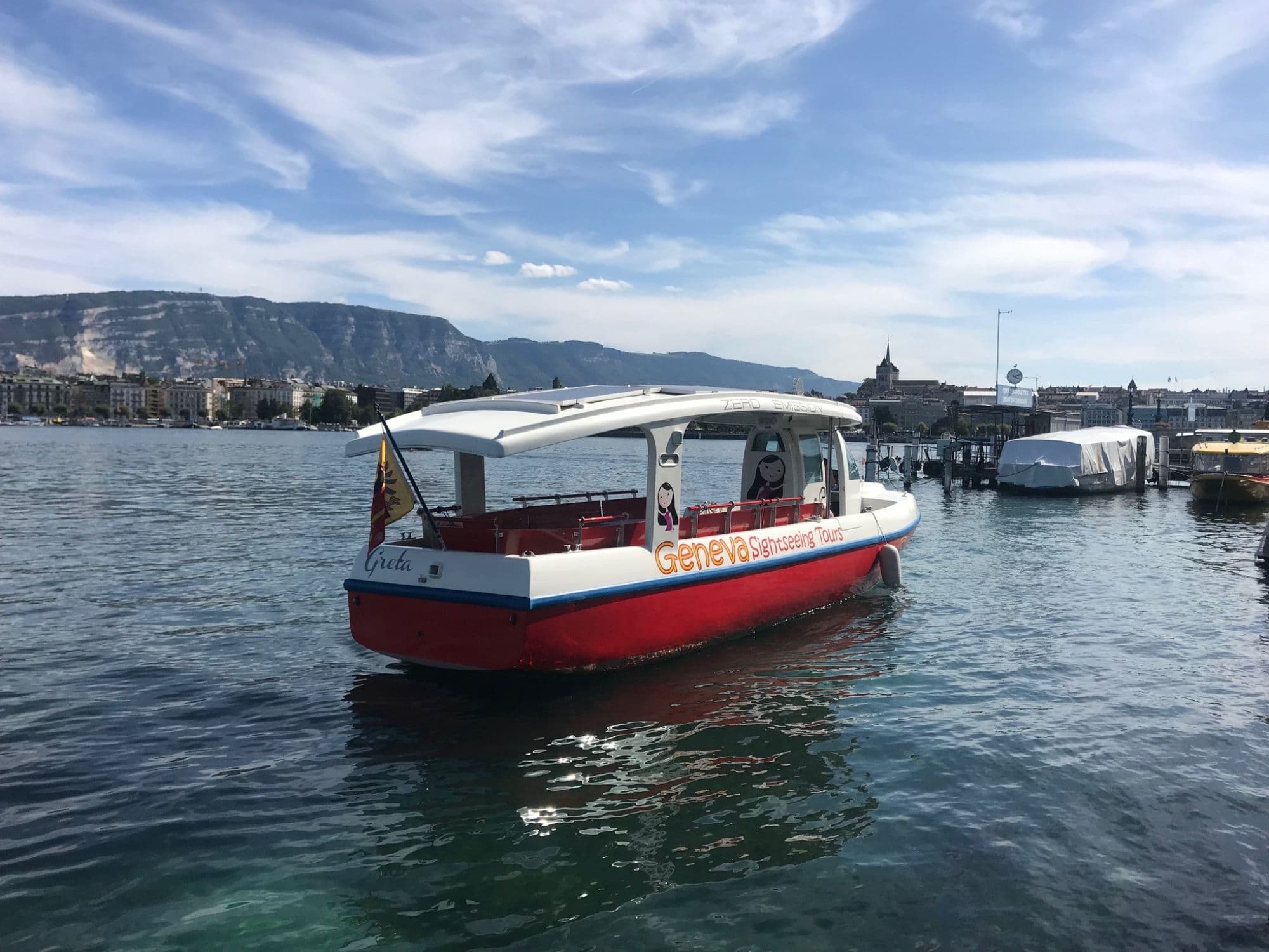 Geneva: City tour, boat cruise, folk show, and cooking class
