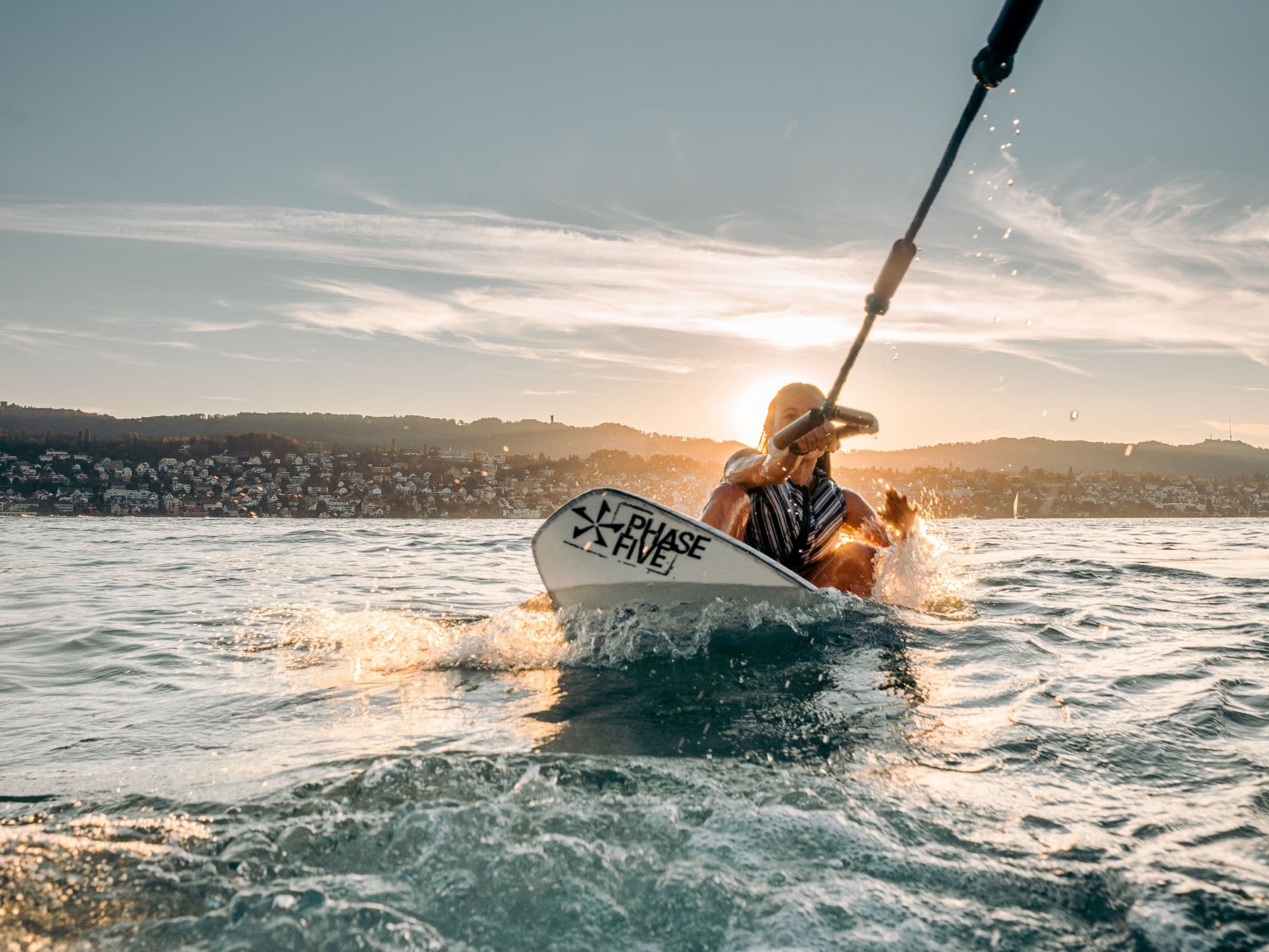 Wakesurfing in Zurich in a private boat