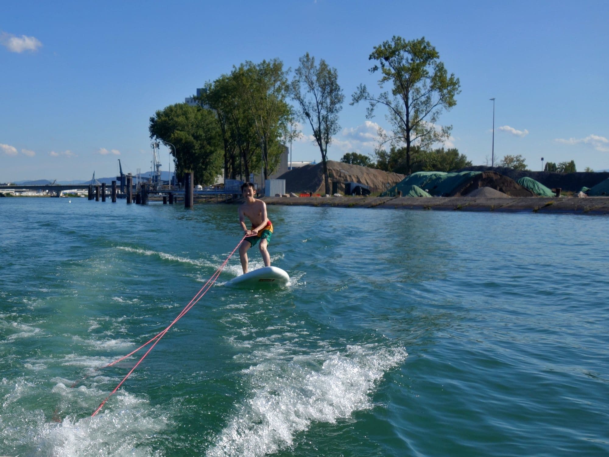 Surfing behind the motorboat on the Rhine