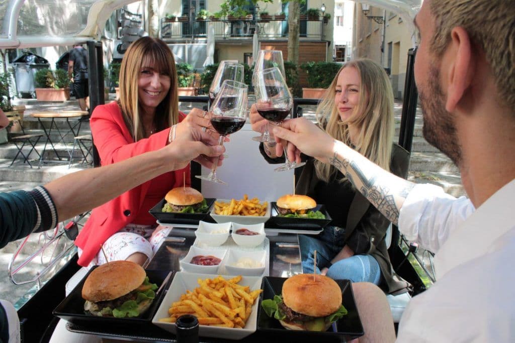 Burger tuk with sides and wine in Zurich